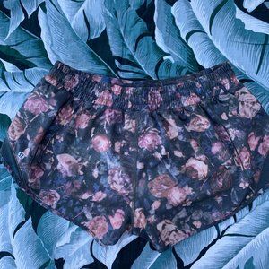 Size 10 - 2.5” LuluLemon Purple Flowered Hotty Hot Shorts